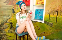 Young babe in knitted hat stripping Young babe in knitted hat stripping