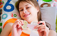 Young chick bending on the bed