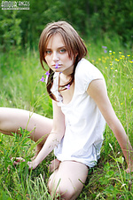 Teen poses outdoors