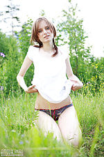Teen poses outdoors
