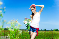 Tiny tit teen in field
