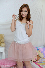 Smiling cutie on bed Smiling cutie on bed