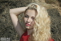 Hot babe on sharp rocks