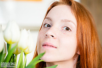 Redhead babe posing naked Redhead babe posing naked