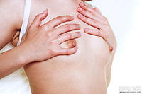 Naked ballerina playing