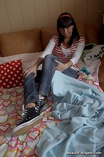 Hot teen takes off her jeans and masturbates