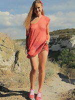 Gorgeous teen embraces the summer with stripping off her clothes in front of beautiful scenery where she can feel free.