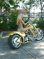 Jana models her new bikini on a bike