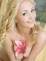This blonde angel is like Eve from paradise, she is soft, sensual, cute, sexy and most importantly naked.