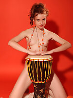 Wild looking natural as well unshaven cutie poses like a professional. She has the sexiest body ever seen by camera lens.