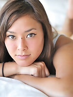 Miyu shows off her shaved pussy