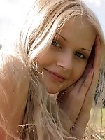 It is the best pastime for this good-looking nude teen to go to such secluded place as field and fondle her amazing treasures there.