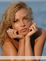 Nice hairy girl poses on the rock