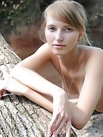 Lovely teen girl dares to strip and pose naked for the first time in front of the camera.