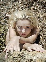 Amazingly lovely teen nude photo model posing in salty water. Fresh as well sexy body lines that can satisfy every need.