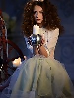 Vintage dress in baroque style enhances the loveliness of this brunette cutie. Hidden passion emerges after she drops the dress.