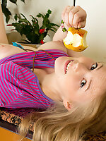 Beautiful sweetie with excellent breasts showing tight ass and shaved pussy in the kitchen.