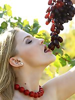 Tinaa loves walking amongst the grape vines as she strips naked except for her brilliant red beads. Watch as her tongue captures the sweet fruit of th