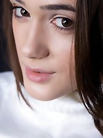 With her youthful, charming look and sweet smile, penelope looks enticingly cute in white dress with matching sheer white stockings.