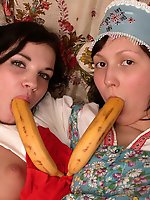 Two innocent teen girls simultaneously filling their wet pussies with a red dildo