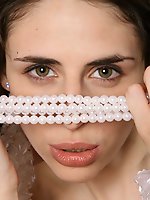 Tall skinny girl in white lingerie is not against some kinky photo session