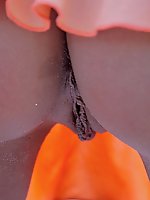 An outdoor shoot featuring danicas tanned and oiled body.