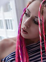 Sassy pink haired mistress shows off her new innovative style in the art of showing off pink teen pussies. Pink wilderness