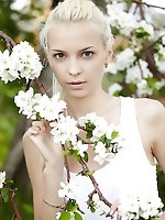 Fresh and youthful, blessed with a doll-like face, petite body with small but tight assets, leonie frolics like a carefree nymph amongst the lush, ver