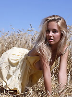 Stunning teen model gets naked in the fields where her food is grown to give some her sexiness to the country side.