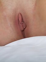 Nassara bares her amazingly curvy body bares her delectable pussy on the bed.