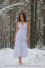 Seductive and unhibited, lena frolics on the white, cold snow.
