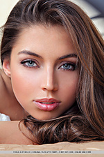 A ravishing brown-haired beauty dressed in dreamy white lace lingerie. A ravishing brown-haired beauty dressed in dreamy white lace lingerie.