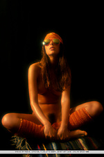 Vika ac showcases her perfectly tanned complexion, gorgeous puffy breasts, untrimmed bush and slender legs in front of the camera.