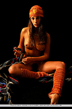 Vika ac showcases her perfectly tanned complexion, gorgeous puffy breasts, untrimmed bush and slender legs in front of the camera.