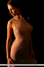 Vika ac showcases her perfectly tanned complexion, gorgeous puffy breasts, untrimmed bush and slender legs in front of the camera.