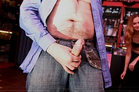 They fuck in an adult bookstore