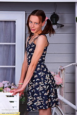 Pigtailed cutie posing Pigtailed cutie posing