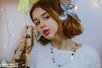 Model posing on her bed Model posing on her bed