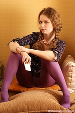 Sexy redhead girl shows off her amazing body