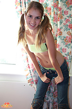 Lustful girl near curtains