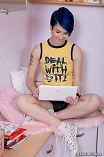 Blue-haired babe eating cum